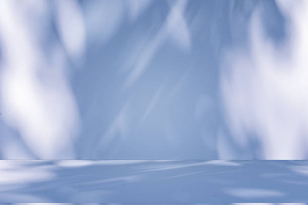 istock Studio style background wall decoration presentation uses white and blue tones. with shadows cast from a nearby window, concept creating a decorative 2218854789