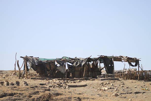 istock The image depicts a rudimentary, dilapidated shelter 2218855499