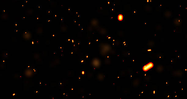 istock Realistic surreal ember fire dust slowly rising up on black bg . Grunge dark fire sparks flying isolated. Overlay spark tiny flake burning animation. Hell rising burst inferno. Fire burst dust move 2218867936