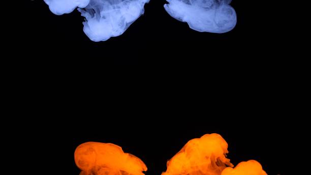 istock Artistic Display of Colorful Smoke on Black Background 2218871118