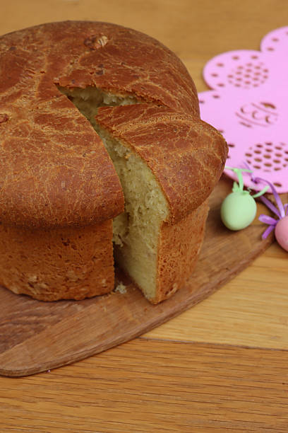 istock Sliced  Italian Easter cake  called Crescia on a  table 2218873069