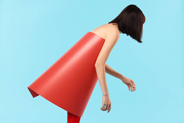 Young woman posing on light blue background