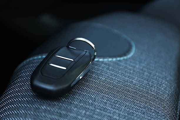 istock Car flip key inside of modern automobile, closeup 2218874553