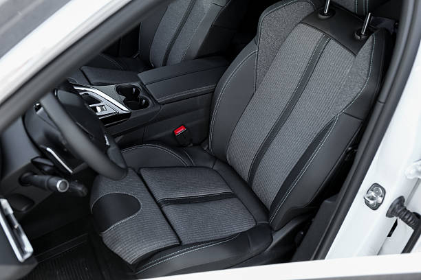 istock Comfortable seats inside of modern white car, closeup 2218874562