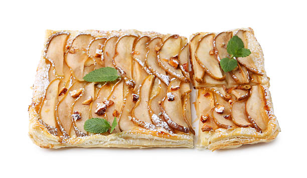 istock Tasty puff pastry pie with pears isolated on white 2218874679