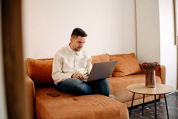 istock Handsome  businessman working on his laptop 2218876548