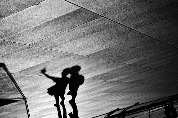 istock Shadow of a Couple in Black and White 2218877071