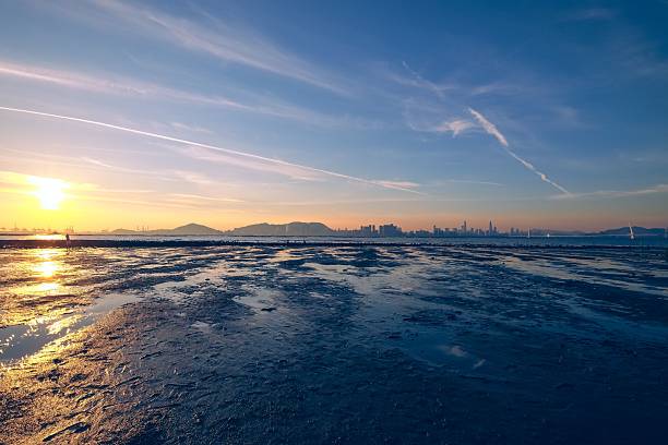 istock Sunset over Coastal City Skyline 2218877107