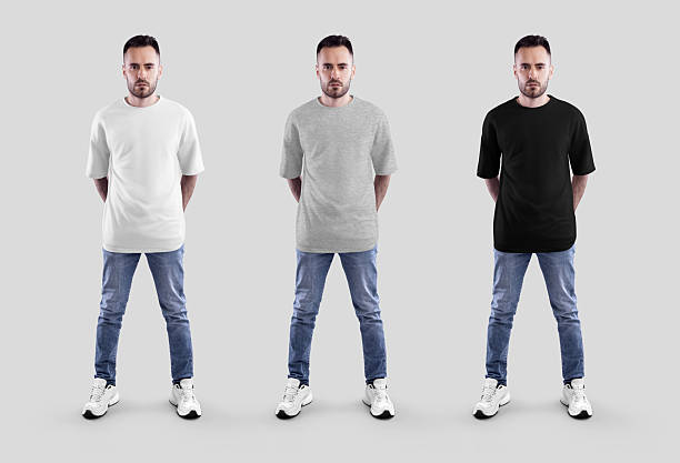 istock White, heather, black oversized t-shirt mockup, full length bearded man with hands behind back, front view. Set 2218883244