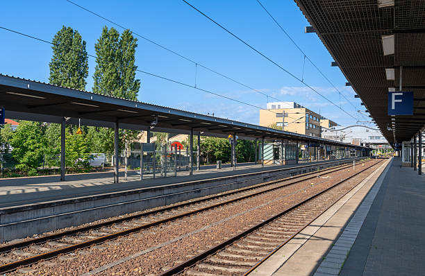 istock Platforms of Potsdam railway station against blue sky 2218884054