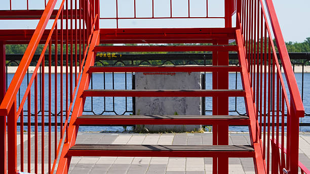 Red steel stairs background with industrial urban architecture and simple tones