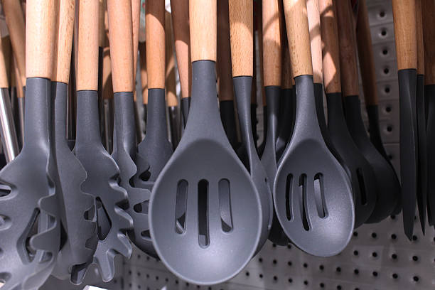 istock plastic blades and gray slotted spoons close-up. Kitchen Set Accessories 2218884923