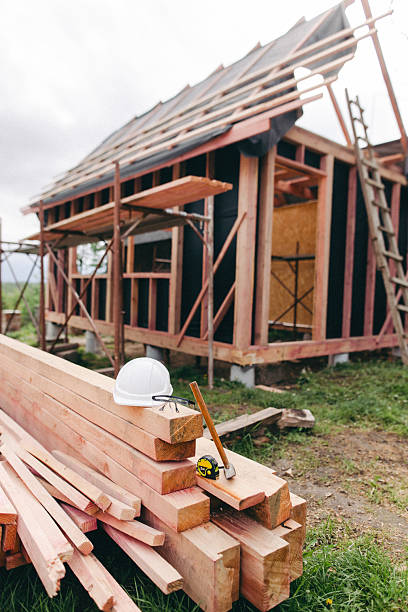 istock The work tools on the stacked lumber at the frame house construction site 2218885980