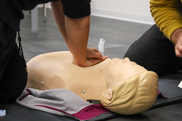 istock first aid course - company safety - cardiac massage - Basic Life Support 2218887973