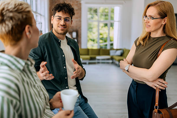istock Business team in office having discussion during coffee break 2218888428
