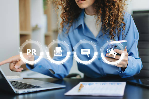 PR, Public relations concept. hands using laptop and tablet with public relations icon for communication advertising marketing strategy.