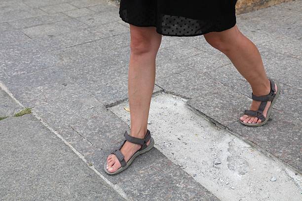 istock Damaged sidewalk in Rome, Italy 2218890413