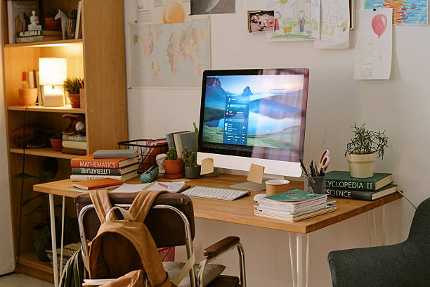 istock Caucasian Child Sitting at Desk Exploring First Pet at Home on Computer 2218891890