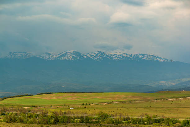 Snowy hilltops in the distance