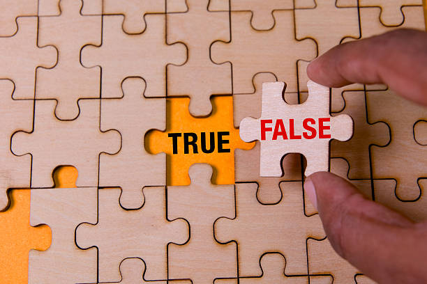 istock Finding the truth in puzzles with true and false pieces 2218901759