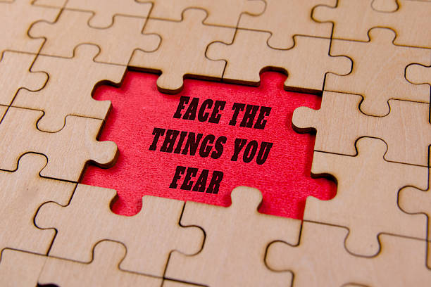 istock Motivational phrase revealed in puzzle pieces close-up 2218901865