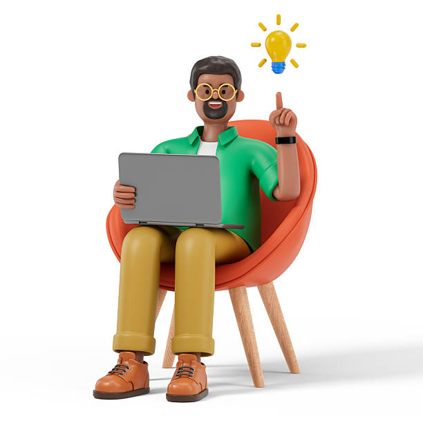 istock A man sits on an orange chair holding a laptop 2218902087
