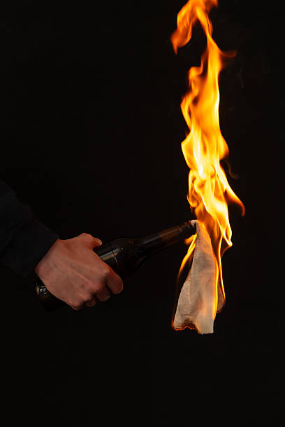 burning paper, glowing edge of paper on a black background.