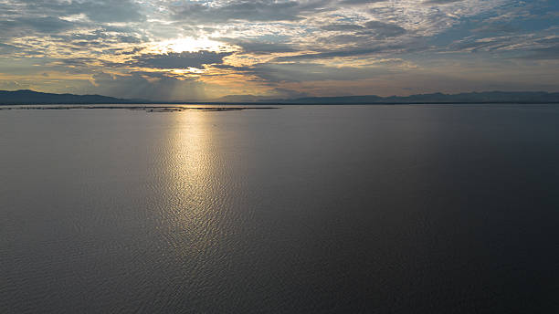 istock Calm Lake Landscape at Sunrise 2218911718