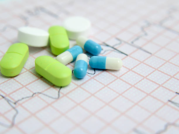 istock lots of pills and medications highlighted on a blue background 2218912647