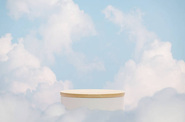 istock Minimal geometry cylinder podium stage with blue sky white fluffy clouds background.product placement pedestal modern stand display,surreal paradise dreamy concept. 2218918004