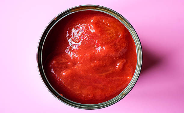 istock Open Tin Or Can Of Plum Tomatoes 2218920560