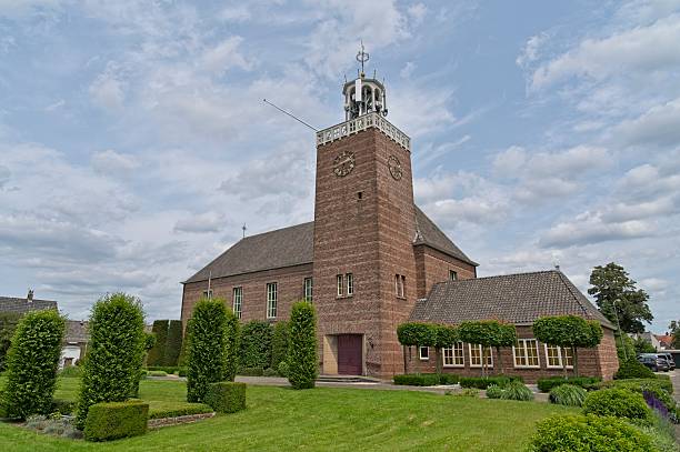 istock Protestant Church Kerkdriel with tower and clock 2218921307