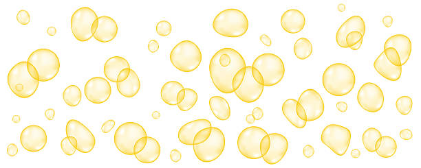 istock Realistic golden collagen, serum or keratin balls. 2218927472