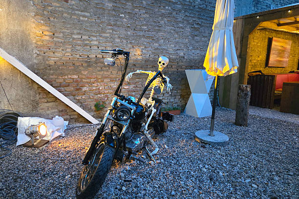 Closeup burnt out motorcycle, background with copy space
