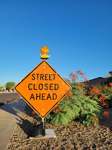 istock Warning Sign about Street Closed Ahead 2218935533