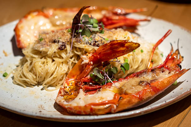 istock Spaghetti with grilled river prawn served on plate 2218937598