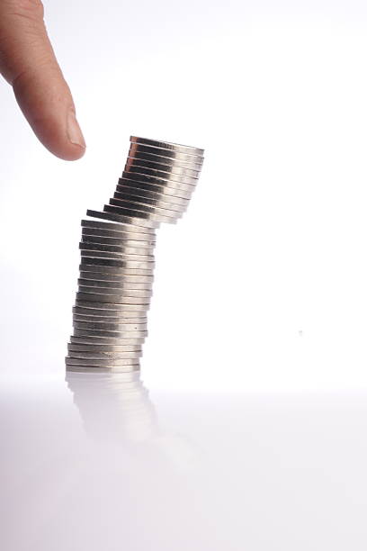 istock Hand holding stacked Argentine coins. 2218938587