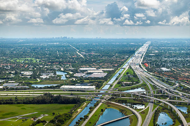 istock Complex highway overpass elevated direction lanes with busy traffic in Miami, Florida. American high speed road crossroads 2218940524