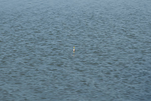 Fisherman holding Fishing float