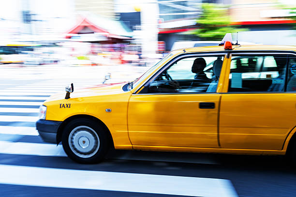 Yellow Cab in Tokyo - panning motion