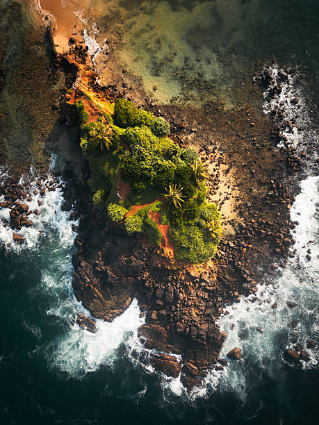 istock Aerial top down view Tourists Sightseeing Parrot rock Island surrounded by turquoise waters and lush mangroves, this small tropical island in sri lanka coastline 2218951237