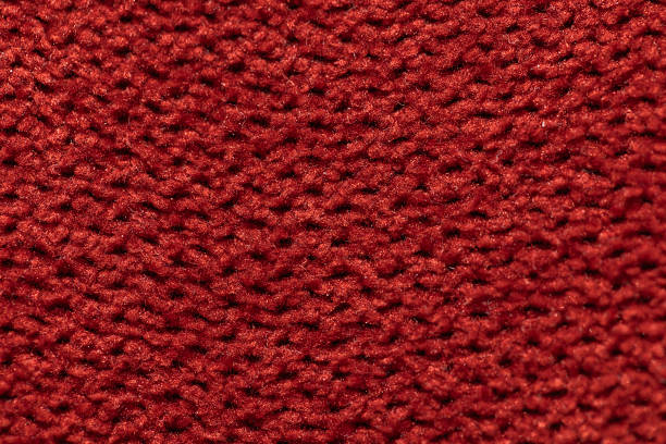 istock Close-up of Vibrant Red Knitted Fabric 2218951419