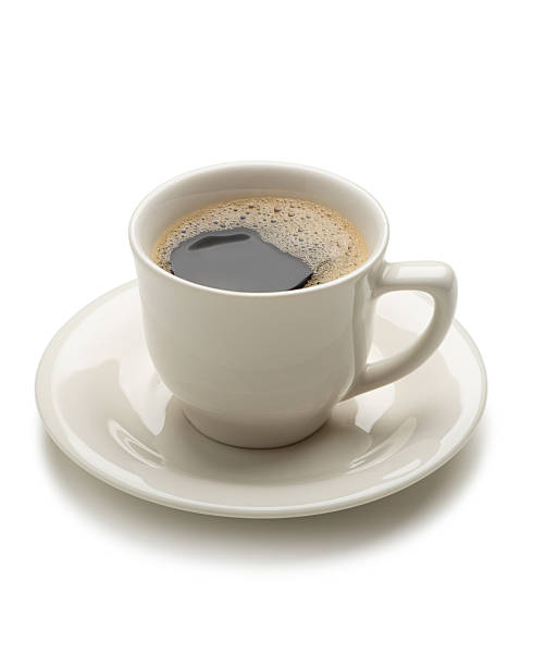 istock White mug with coffee on white isolated background 2218951485