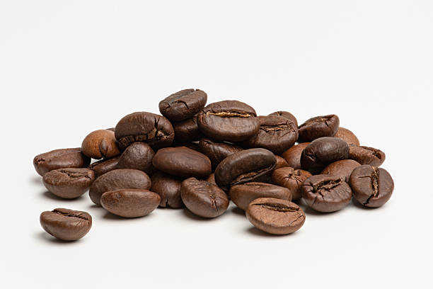 istock A pile of coffee beans on a white background 2218952219