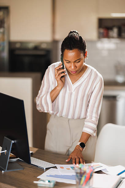 istock Woman Using Smartphone And Working At Home 2218953726