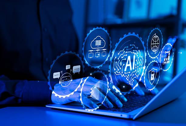 istock Artificial Intelligence and Digital Automation Concept. A person using laptop with AI icons, cloud computing, robotics, cybersecurity, and chatbot automation, symbolizing digital transformation. 2218954738