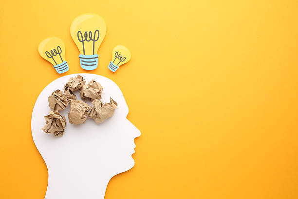 istock Creative thinking ideas and innovation concepts. Yellow coloured light bulb on the background 2218957302
