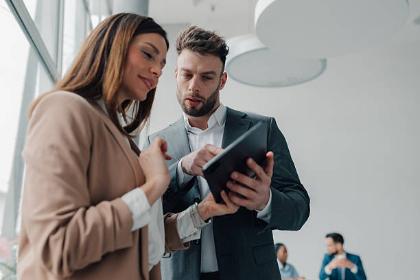 istock Business colleagues using digital tablet in modern office 2218957635