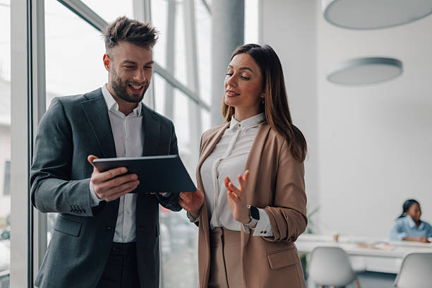 istock Business colleagues using digital tablet in modern office 2218957647