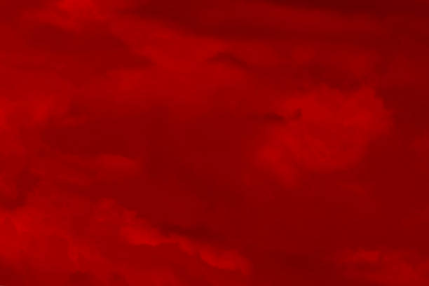 istock Red cloud texture background. Blurred photo of red sky with clouds. 2218958133